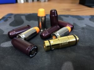 An image of snap caps and laser bullet for dry fire training.