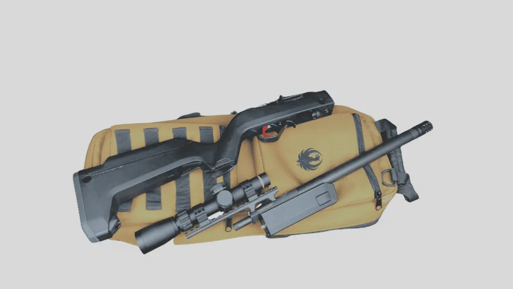 Why I Chose the Ruger 10/22 Takedown 6 Scope-equipped air rifle with a tan gun bag for hunting and shooting sports.