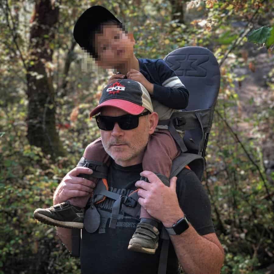 The author, Josh Malcolm wearing the FortKnight Optics 308 Free Range sunglasses while hiking with his son.